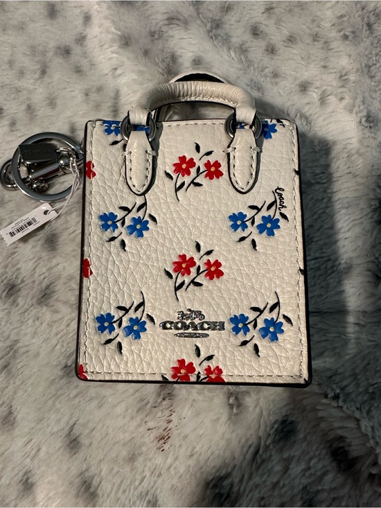Coach Handbags - NWT Coach White Floral Mini Tote Bag with Red & Blue Flowers